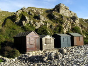 SY6971 : Beach huts, Church Ope Cove