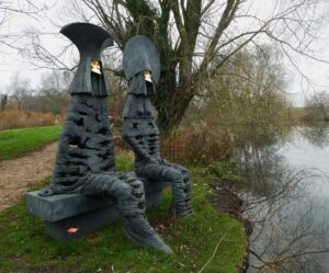 SY7891 : Sculpture by the lakes - Watchers by the lake