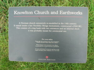 SU0210 : Knowlton: church and earthworks sign