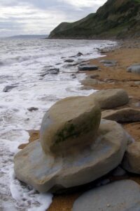 SY4391 : Hat-shaped boulder on the beach, Eype