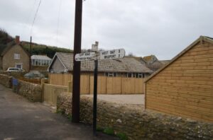 SY4889 : Road sign, Burton Bradstock