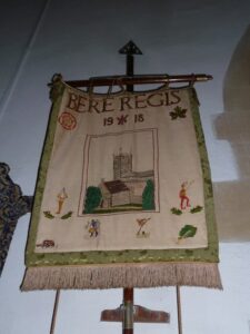 SY8494 : St John The Baptist, Bere Regis: banner (B)