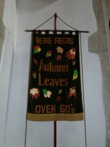SY8494 : St John The Baptist, Bere Regis: banner (D)