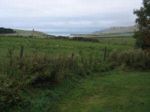 SY9178 : View of Clavell Tower and Kimmeridge Bay from footpath leading from Smedmore House